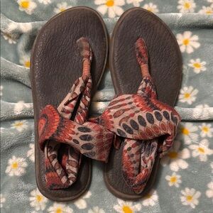 Sanuk Red and Brown Thong Sandals with Intricate Strap Design